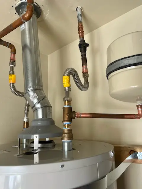 Water heater installation and plumbing repair in Leighton